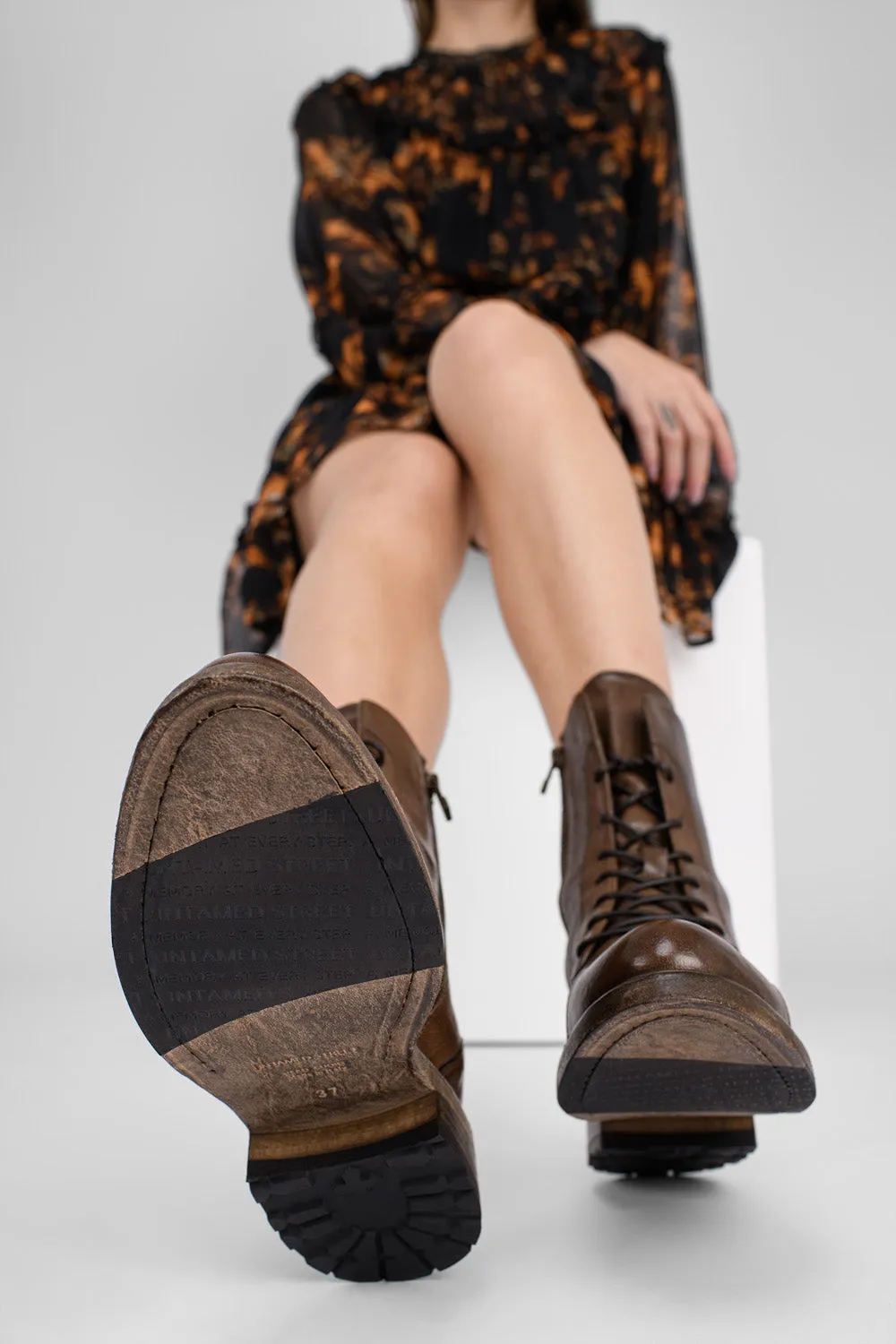 AVERY powder-chocolate lace up boots.
