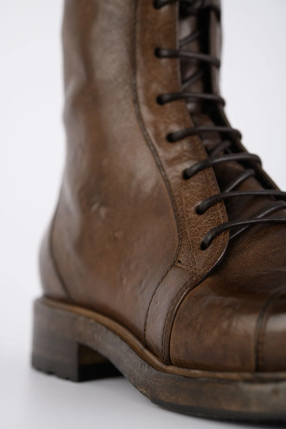 AVERY powder-chocolate lace up boots.