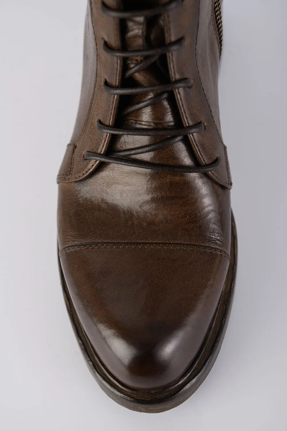 AVERY powder-chocolate lace up boots.
