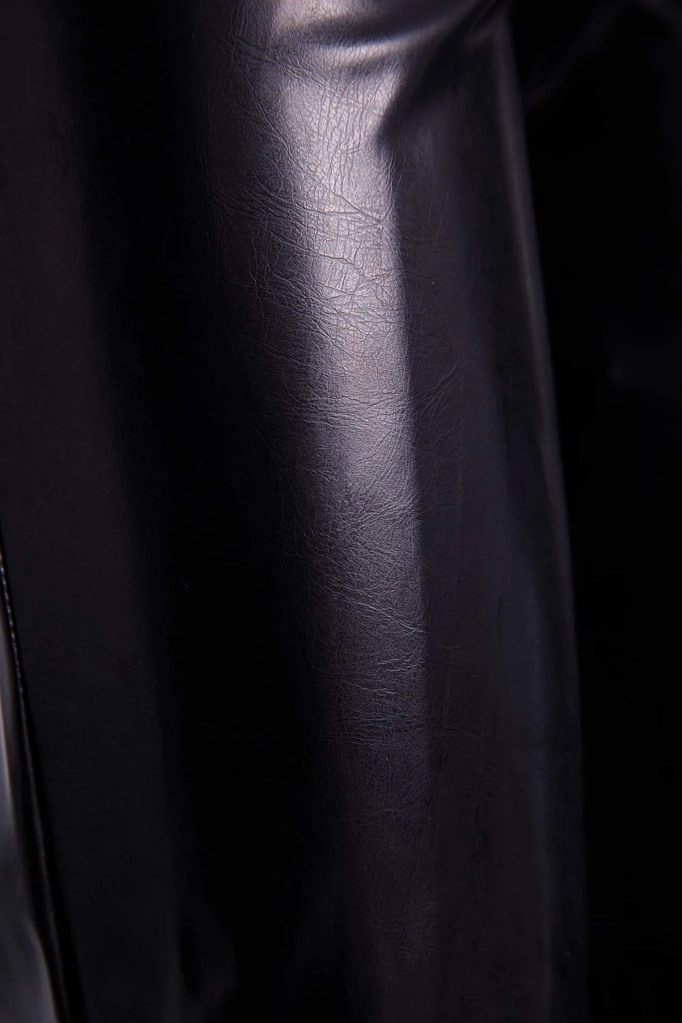 LEATHER EFFECT TROUSERS